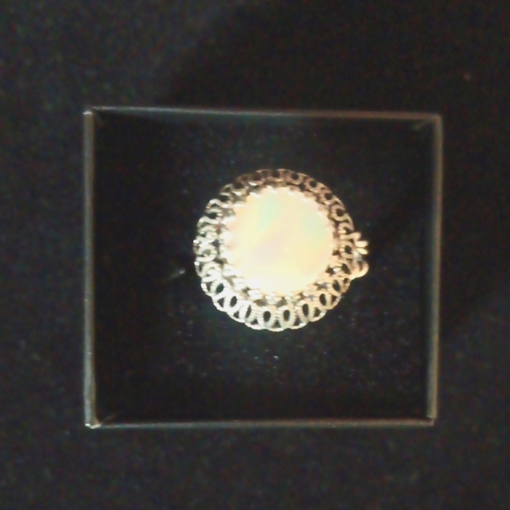 Fire Opal Silver Ring with Intricate Design